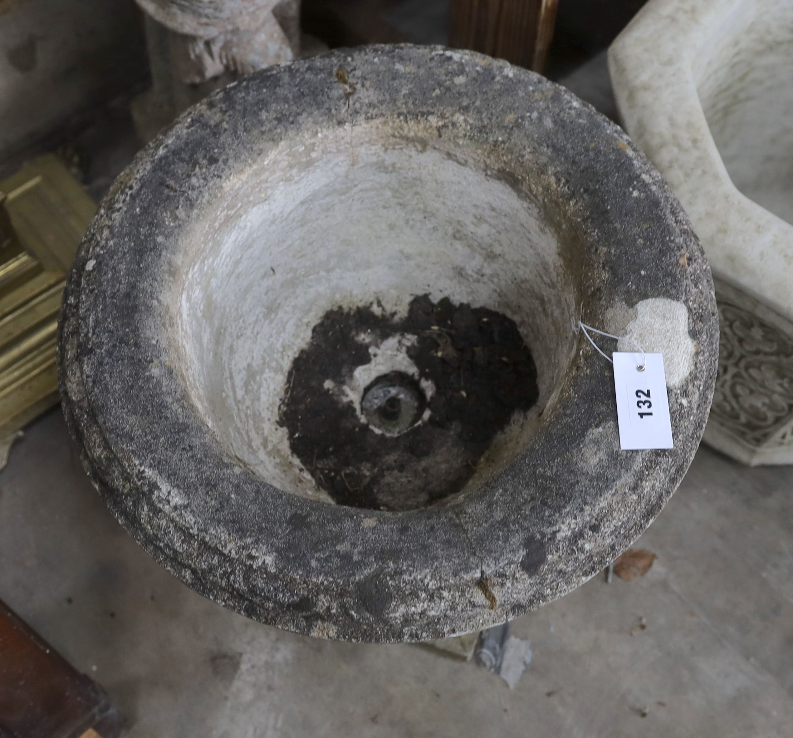 A reconstituted stone campana garden urn, diameter 50cm, height 48cm